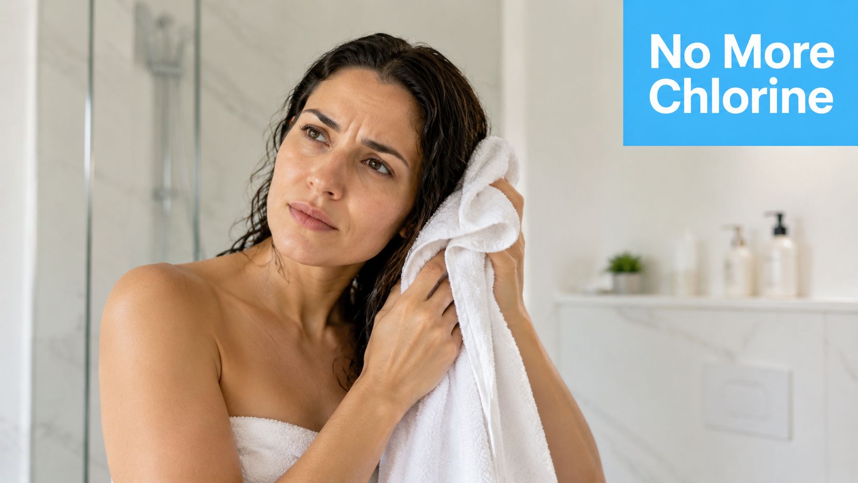 A woman towel-drying her hair in a modern bathroom with a No More Chlorine text overlay.