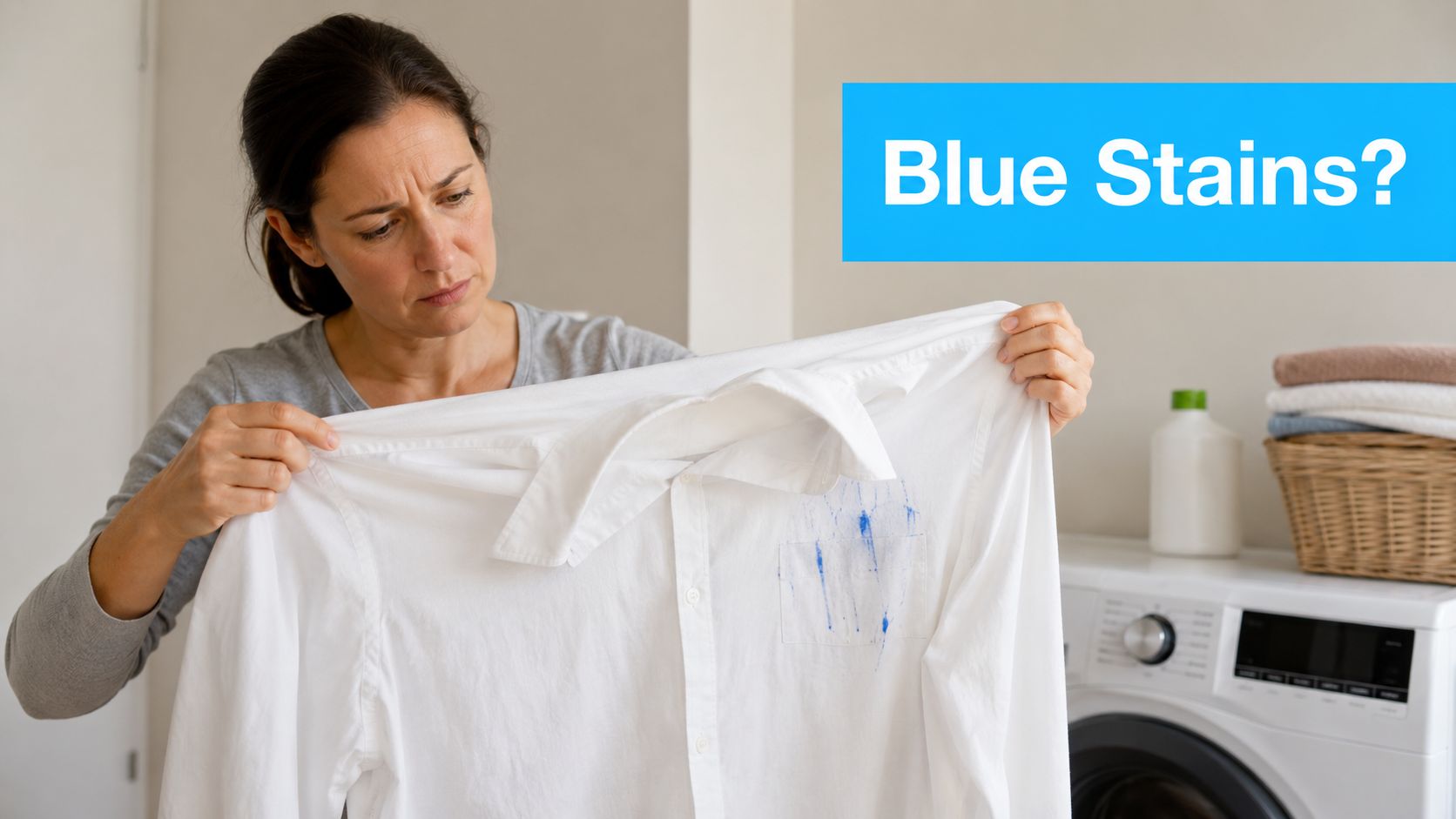 A concerned woman inspects a white dress shirt with blue ink stains after doing laundry.