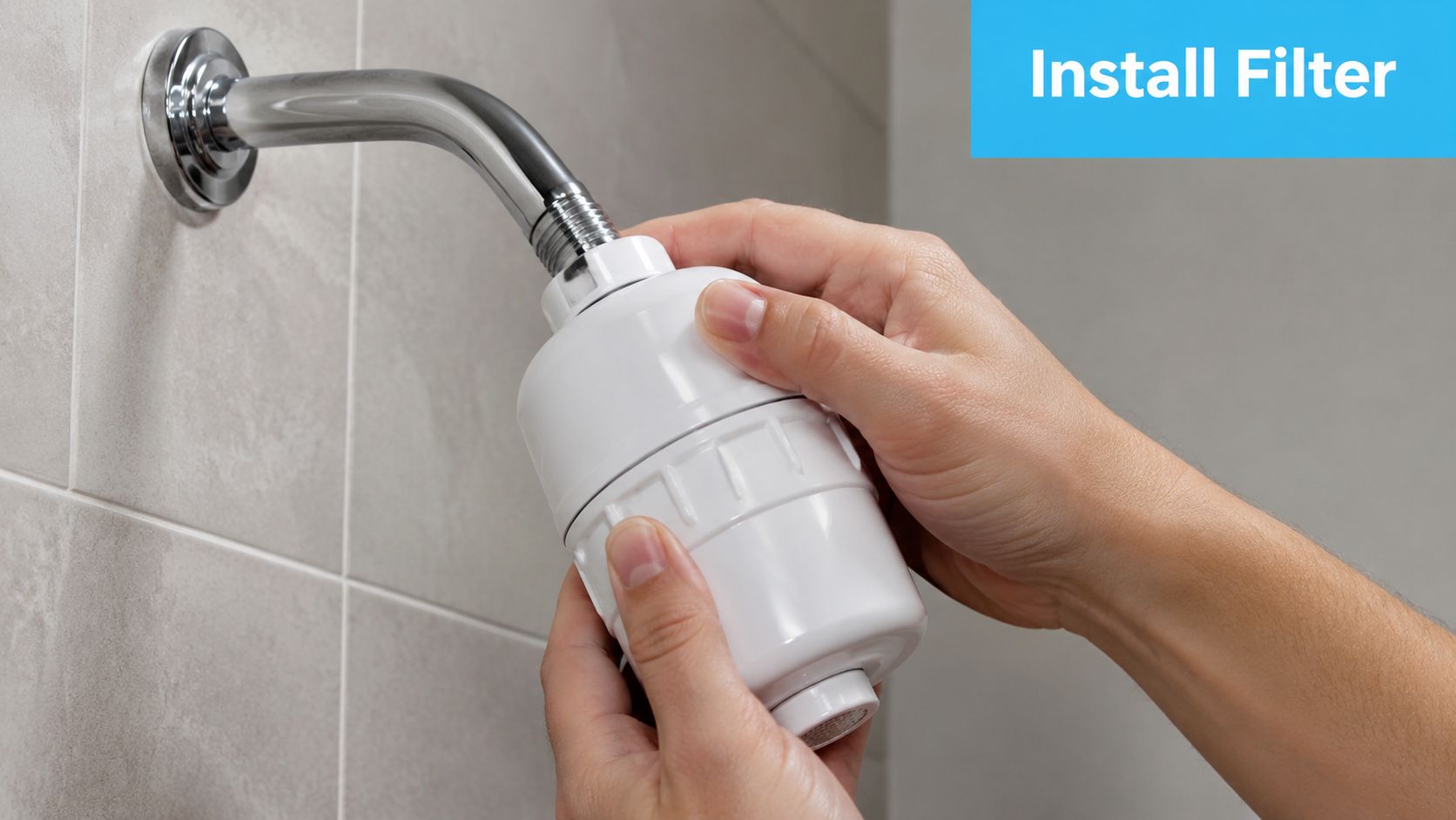 A pair of hands screwing a white shower filter unit onto a wall-mounted shower arm pipe.