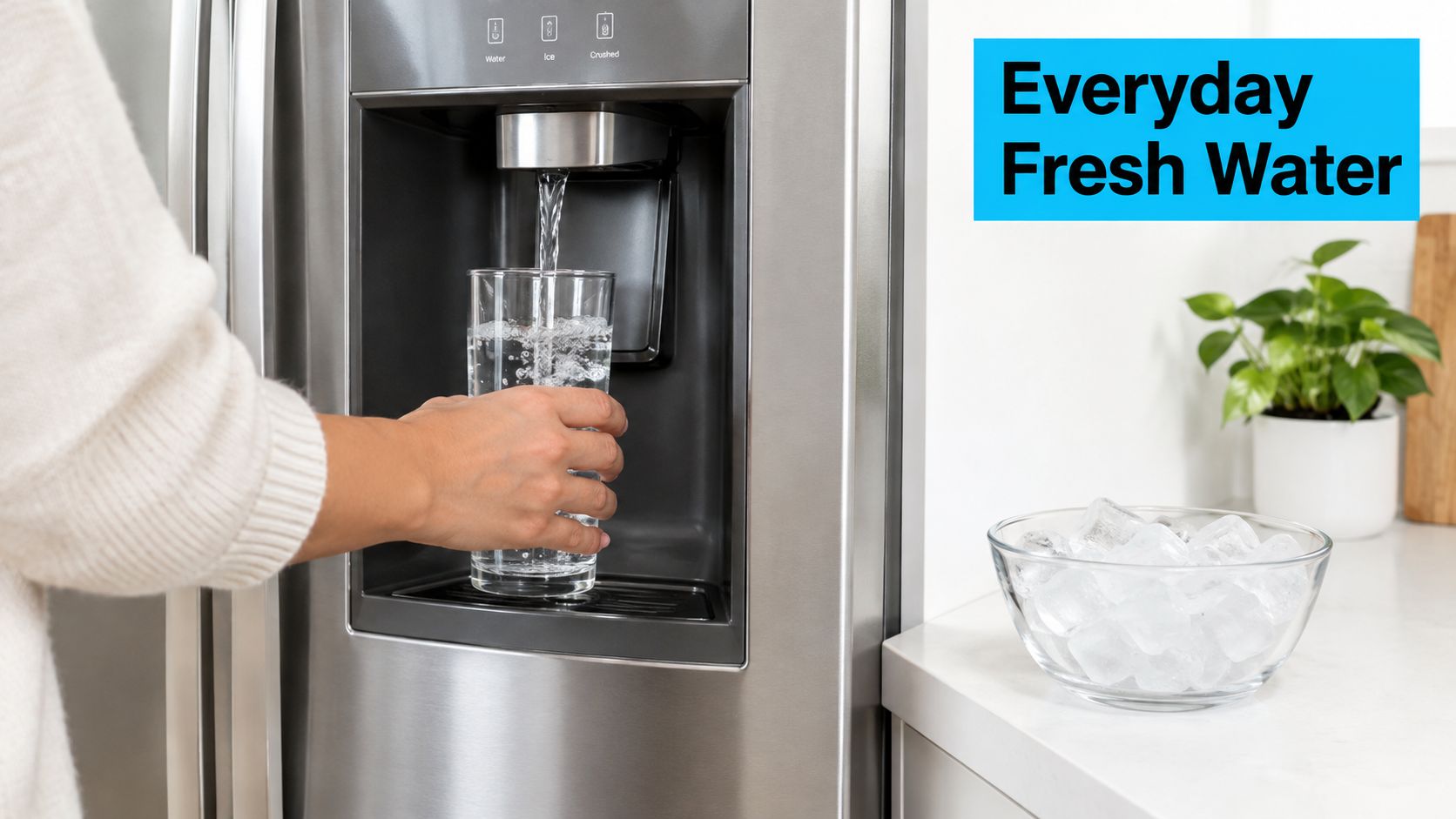A person holding a glass under a refrigerator water dispenser to get fresh cold water.